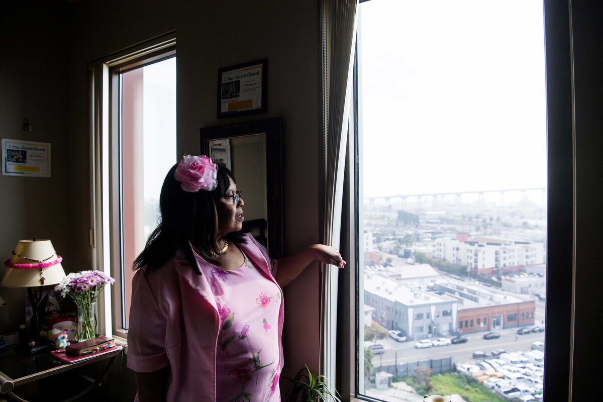 Resident at Father Joes Villages looks out window.