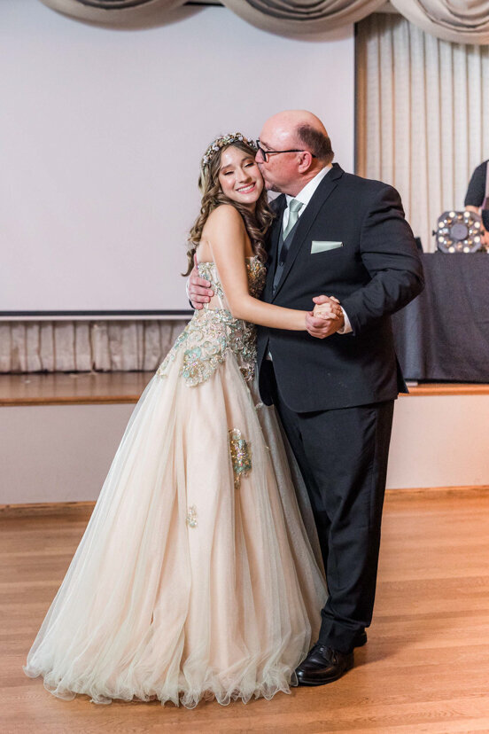 father-kissing-daughter-dance