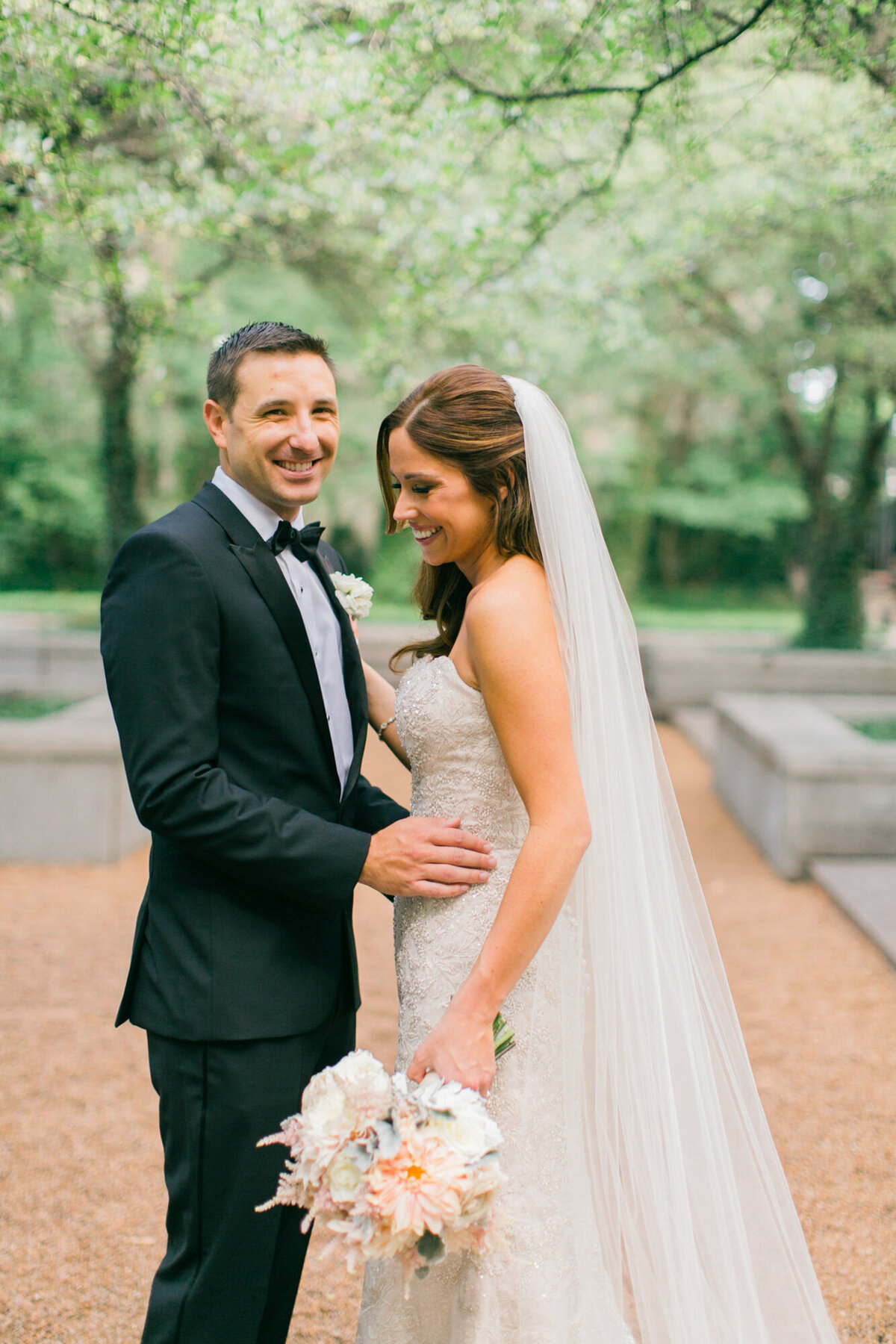 A candid moment between a bride and groom at the Art Institute of Chicago