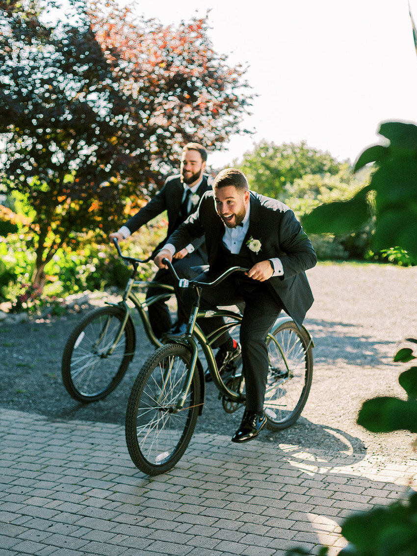 Groomsmen on bikes at destination wedding