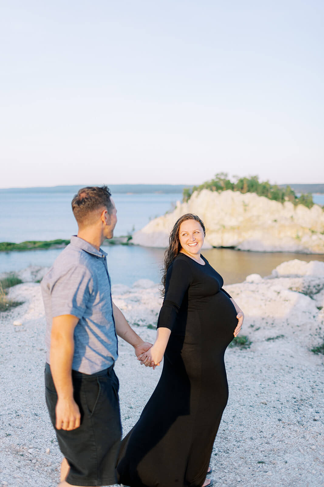 man-and-woman-walk-on-beach