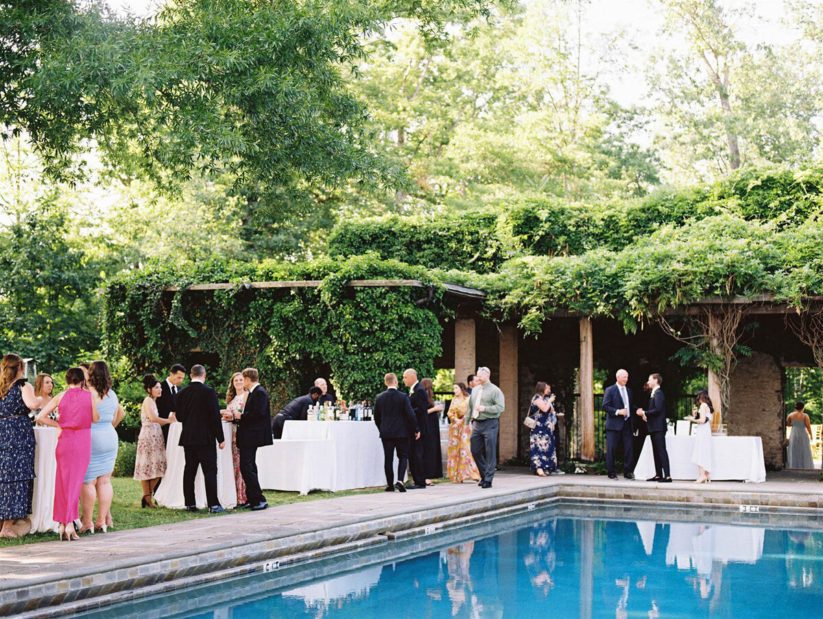 A colorful image of a poolside celebration at goodstone Inn