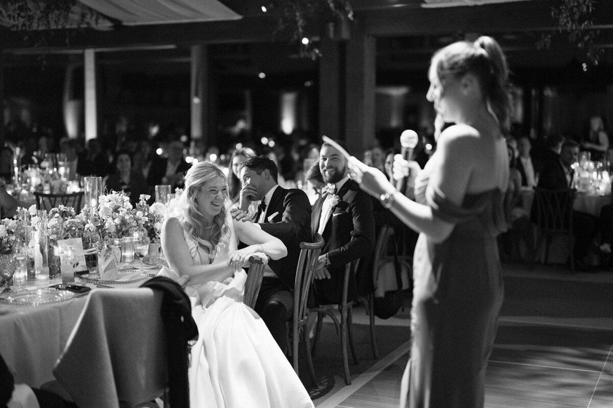 sister-giving-toast-bride-smiling-aspen-HBICWeddings