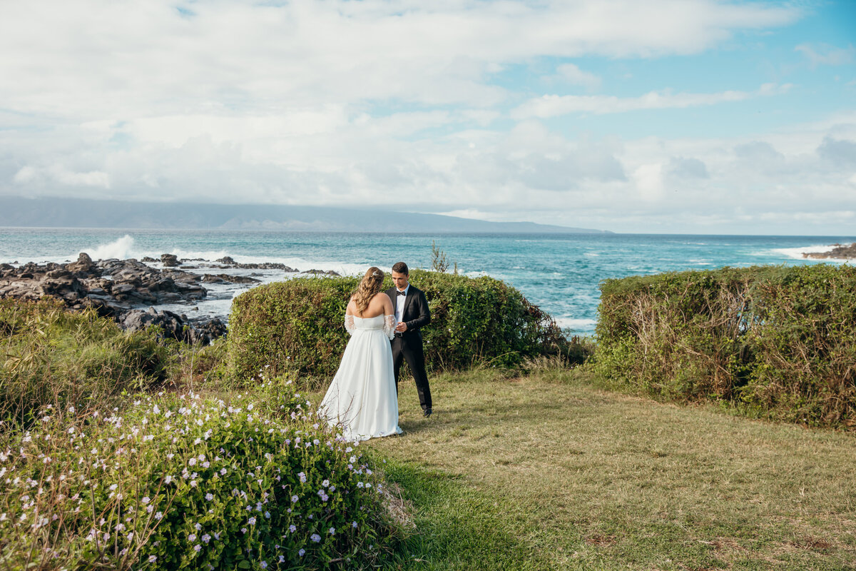 Maui Wedding Photographer captures bride and groom reading vows privately