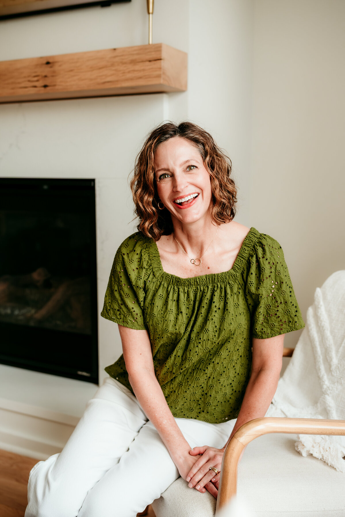 Branding photo of a creative founder in Minneapolis showcasing personality, brand vision, and workspace.