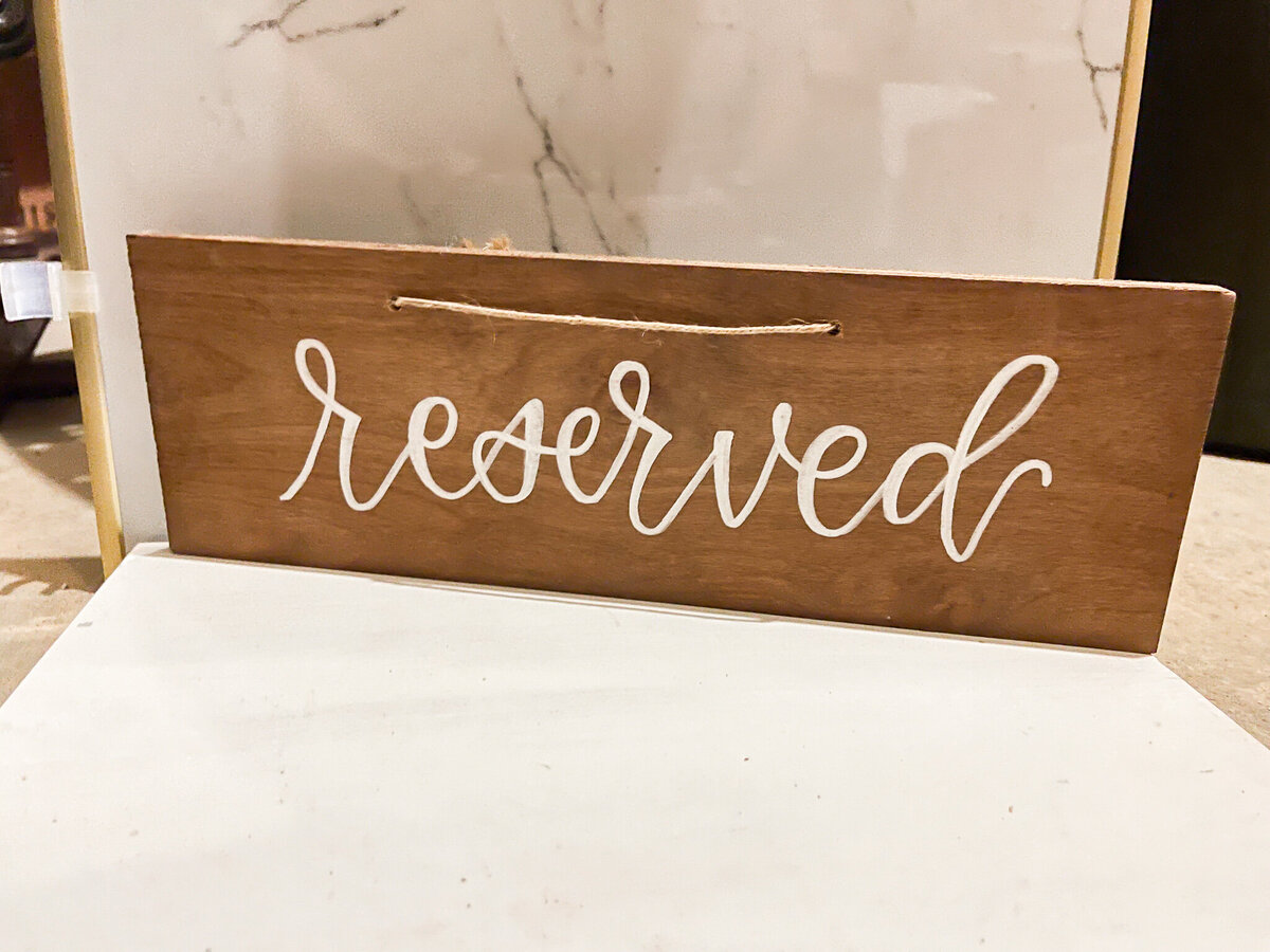 Joy-Unscripted-Rentals-Wooden-Reserved-Sign