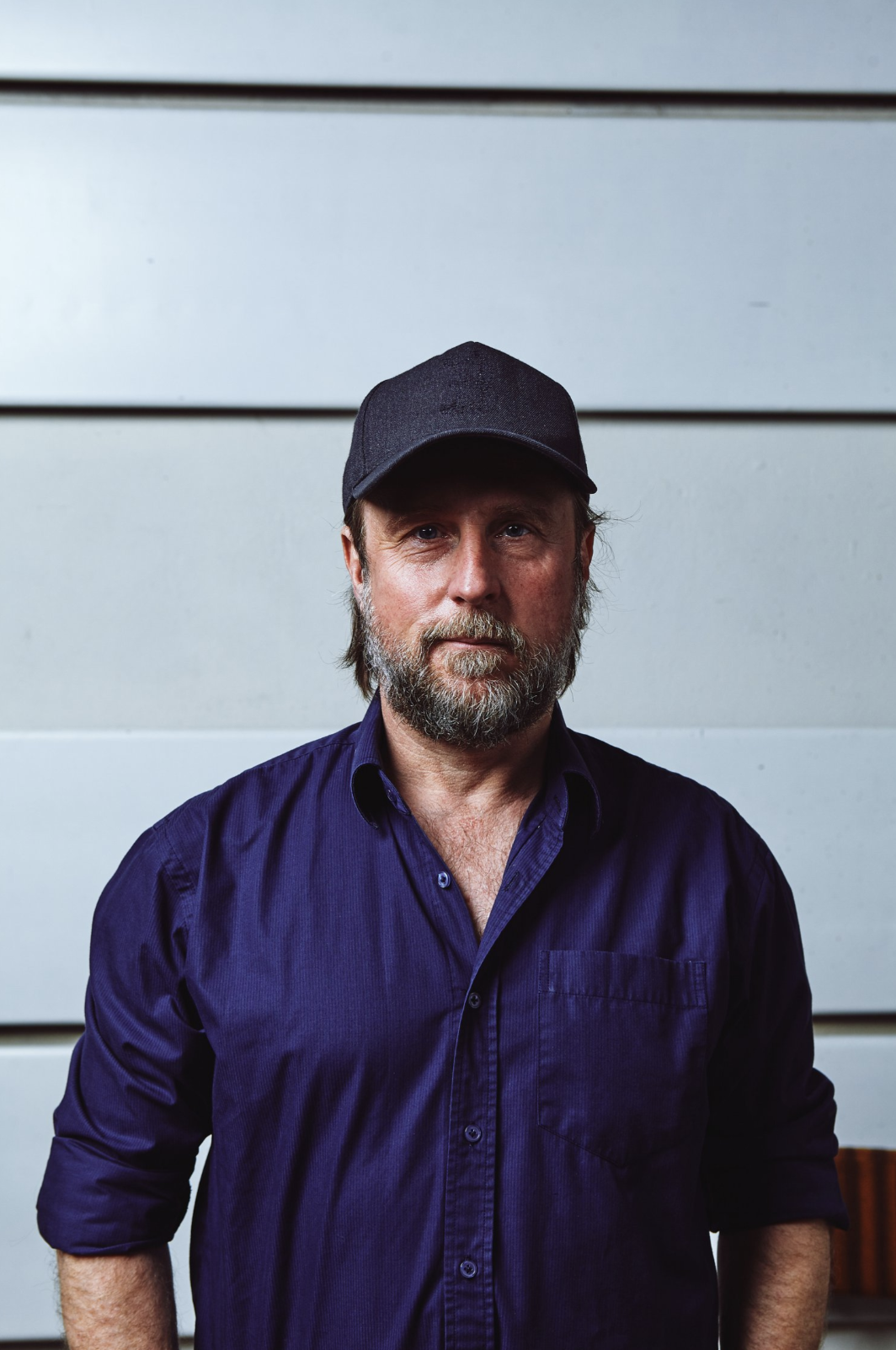 Cinematic lighting shaping emotional context in a narrative frame.