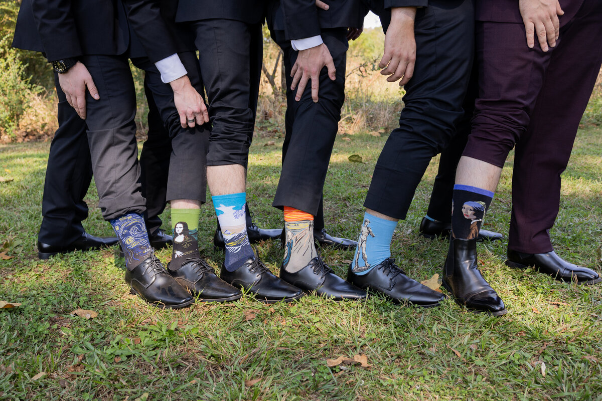 groom-silly-sock-whiskey-bonding-farm-Amanda-Richardson-Photography