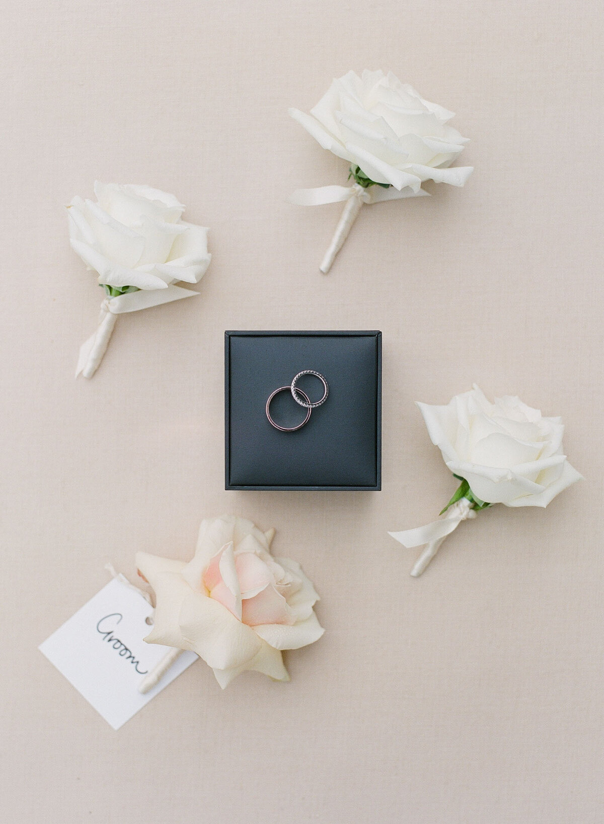 Boutonnieres and wedding rings