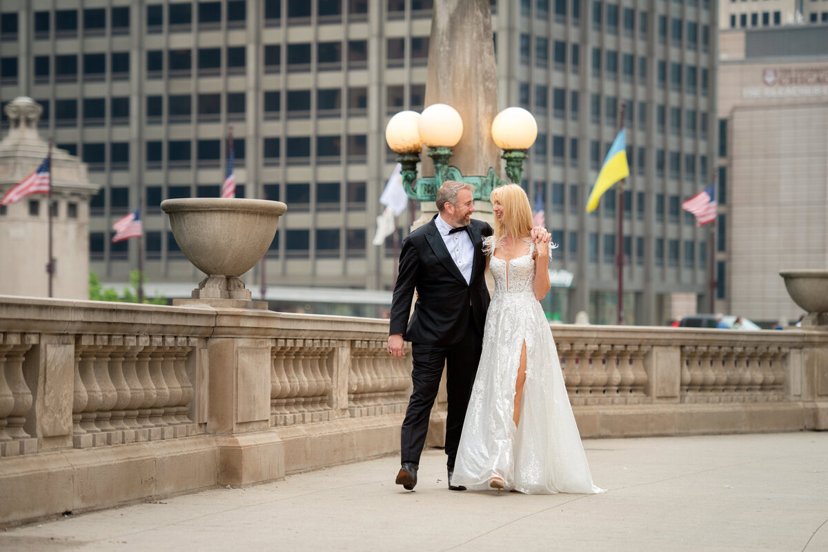 Newlyweds holding and looking at each other  in beautiful Chicago