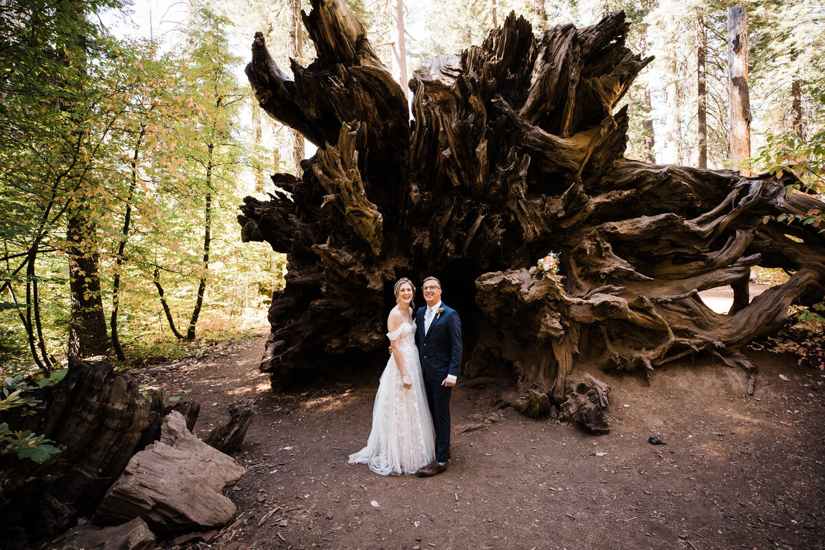 bride and groom walk along a river during their iceland elopement