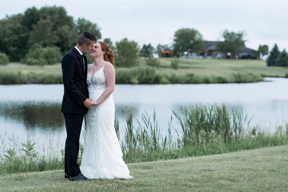 Candid laughter between bride and groom