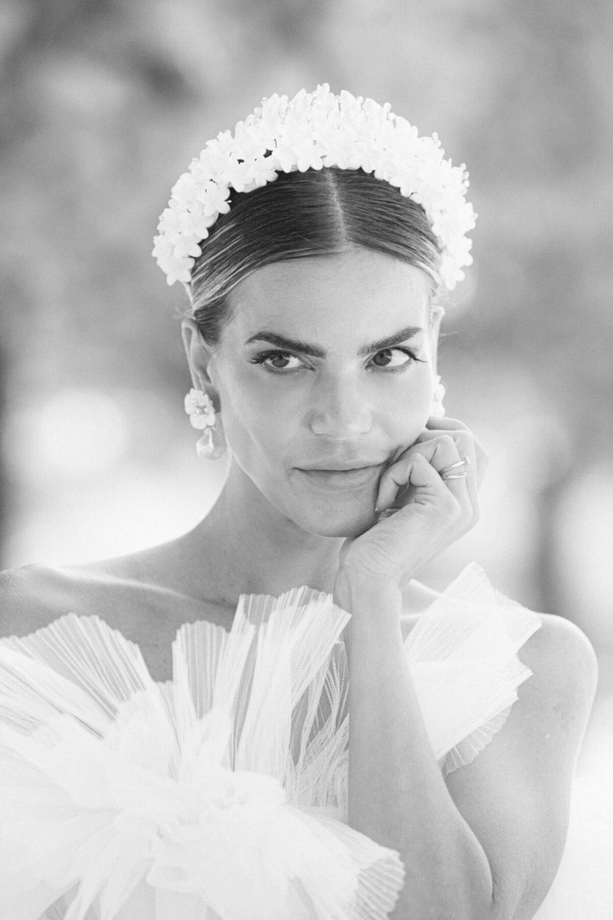A wedding photo of a bride in her white dress in the streets of Paris in France.