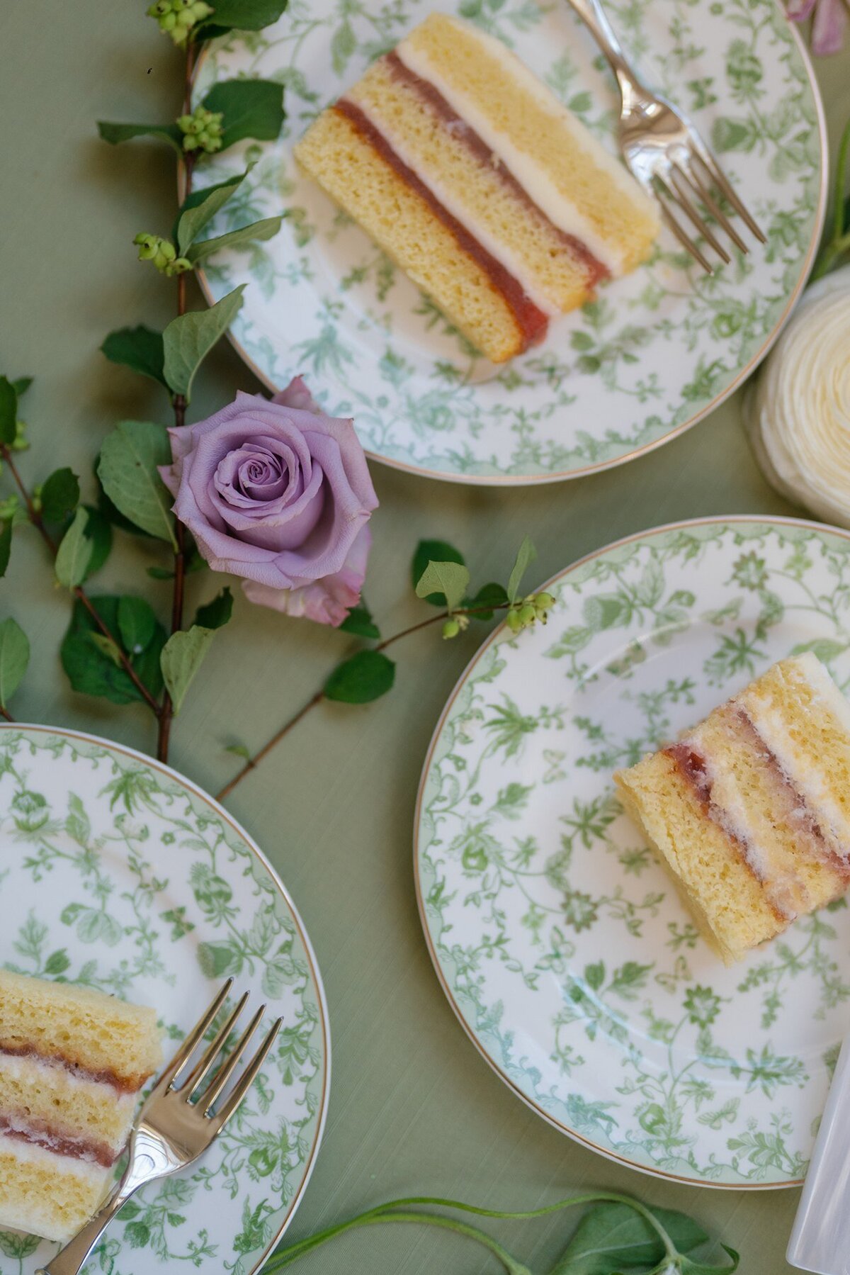 A piece of cake on a floral plate 