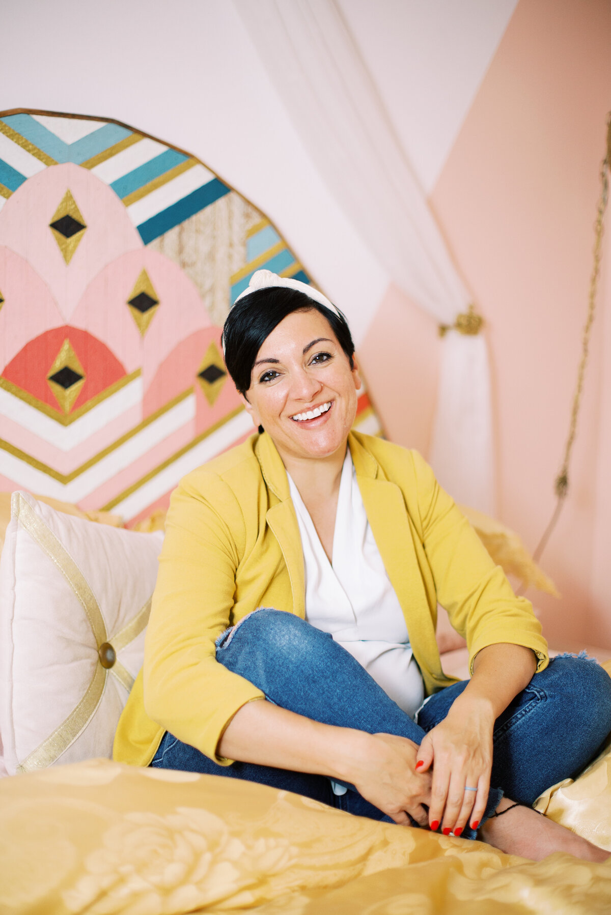 Dolly DeLong A Nashville Based Branding Photographer and Systems and Workflow Educator stands at the Nashville Pinky House for Headshots