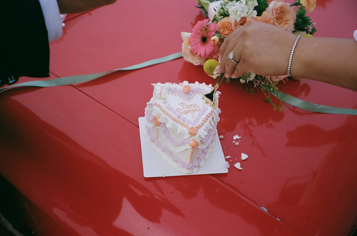 Micro wedding cake on classic car