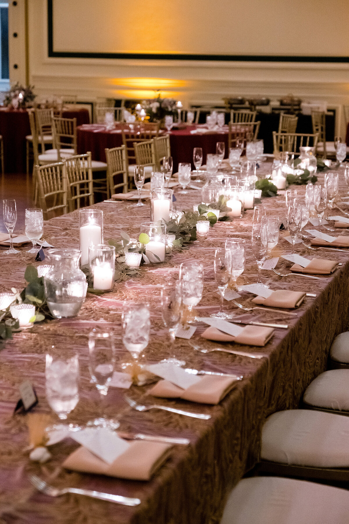 wedding decor setup on a long table at the soldiers and sailors memorial hall