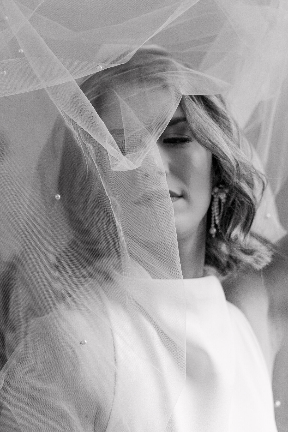 Bride with veil during bride getting ready session