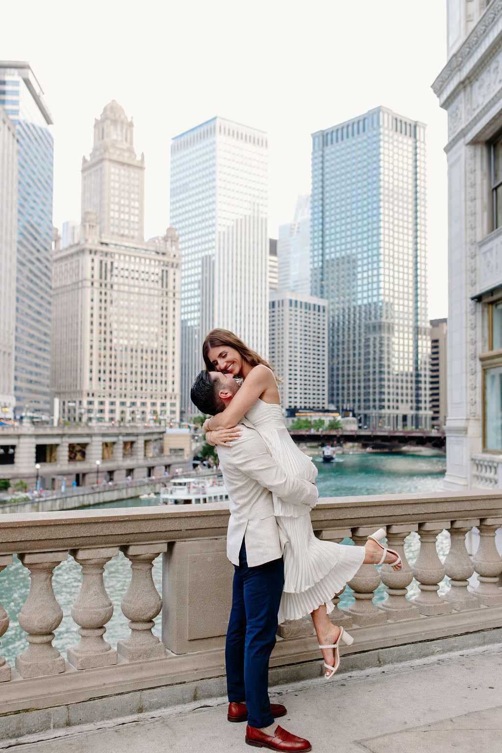 An engagement photography session at The Wrigley Building and North Ave Beach in Chicago, Illinois - 18