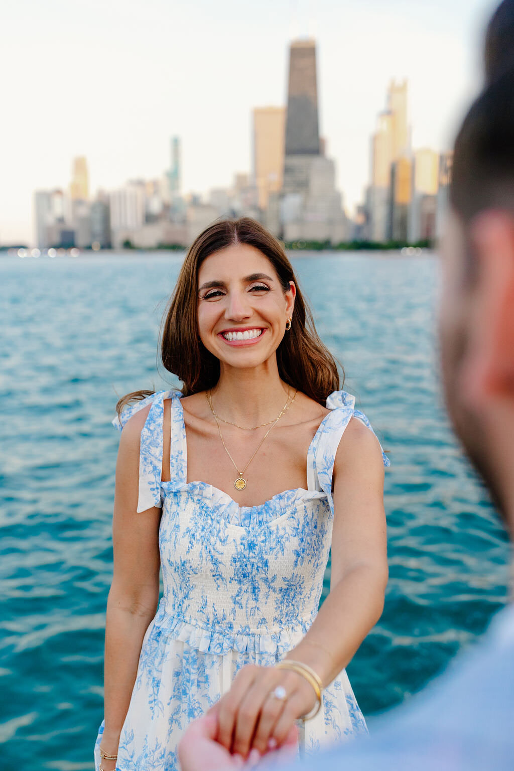 An engagement photography session at The Wrigley Building and North Ave Beach in Chicago, Illinois - 39