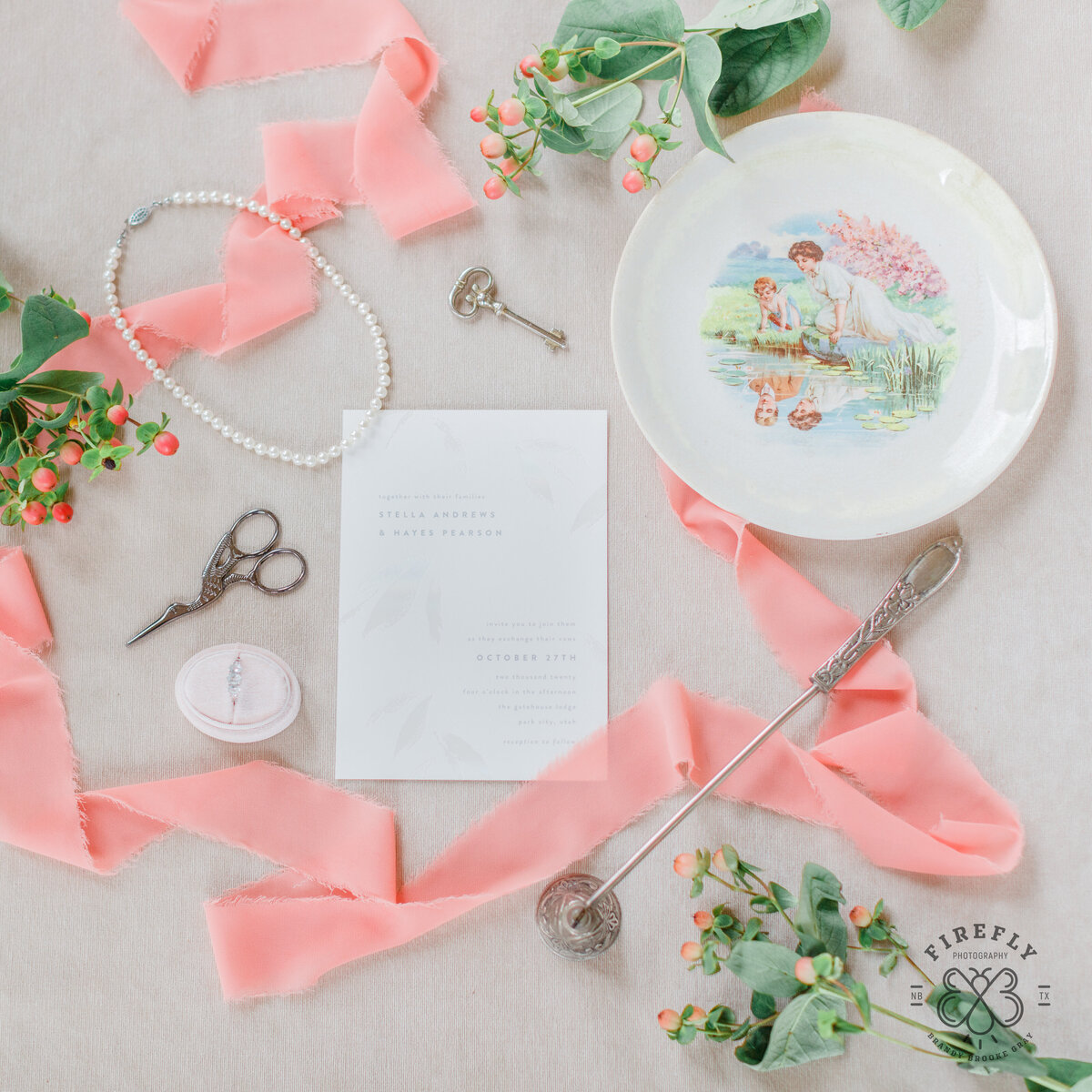 wedding invitation detail with antique plate scissors and pearls by Firefly Photography