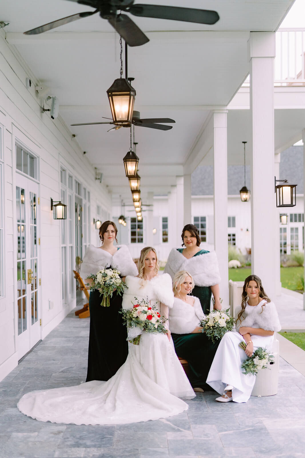 Bride posing with bridesmaids at The Lake House on Canandaigua, Finger Lakes, NY