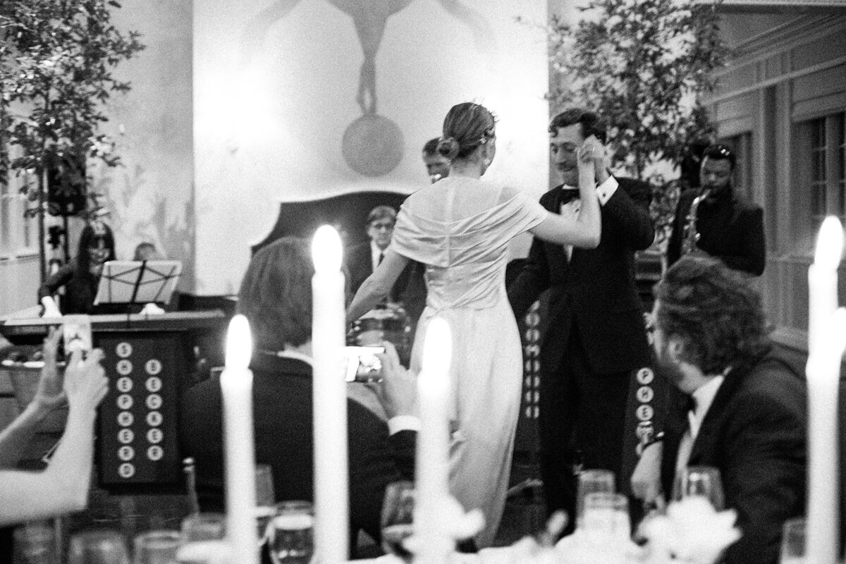 First dance as husband and wife in front of candle light