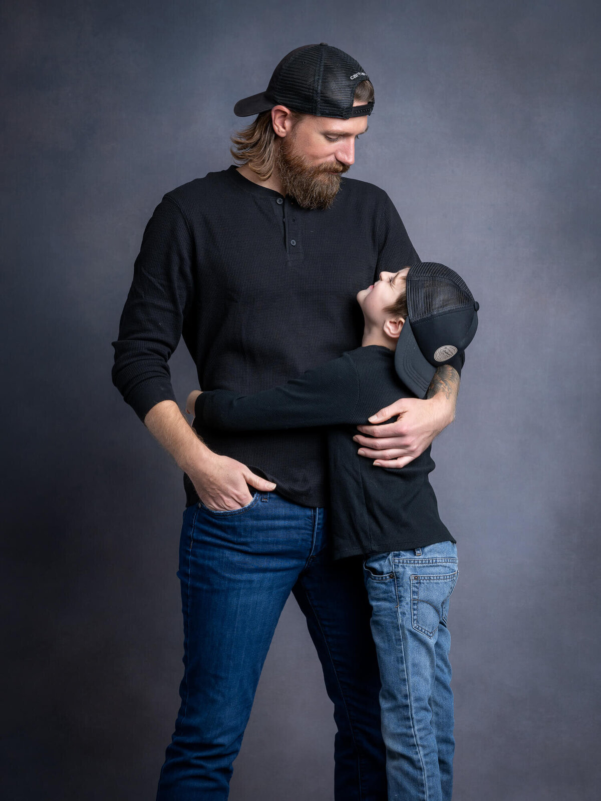 Father and son pose in Prescott family photos by Melissa Byrne