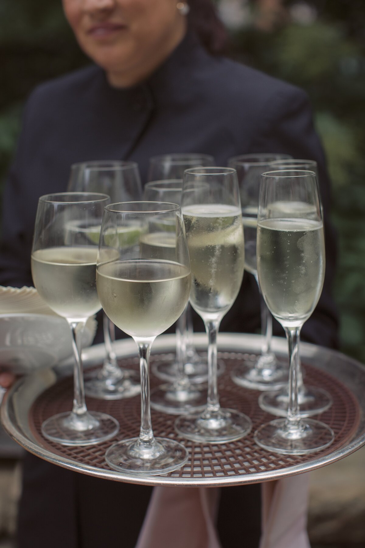 Close up of tray of wedding champagne.