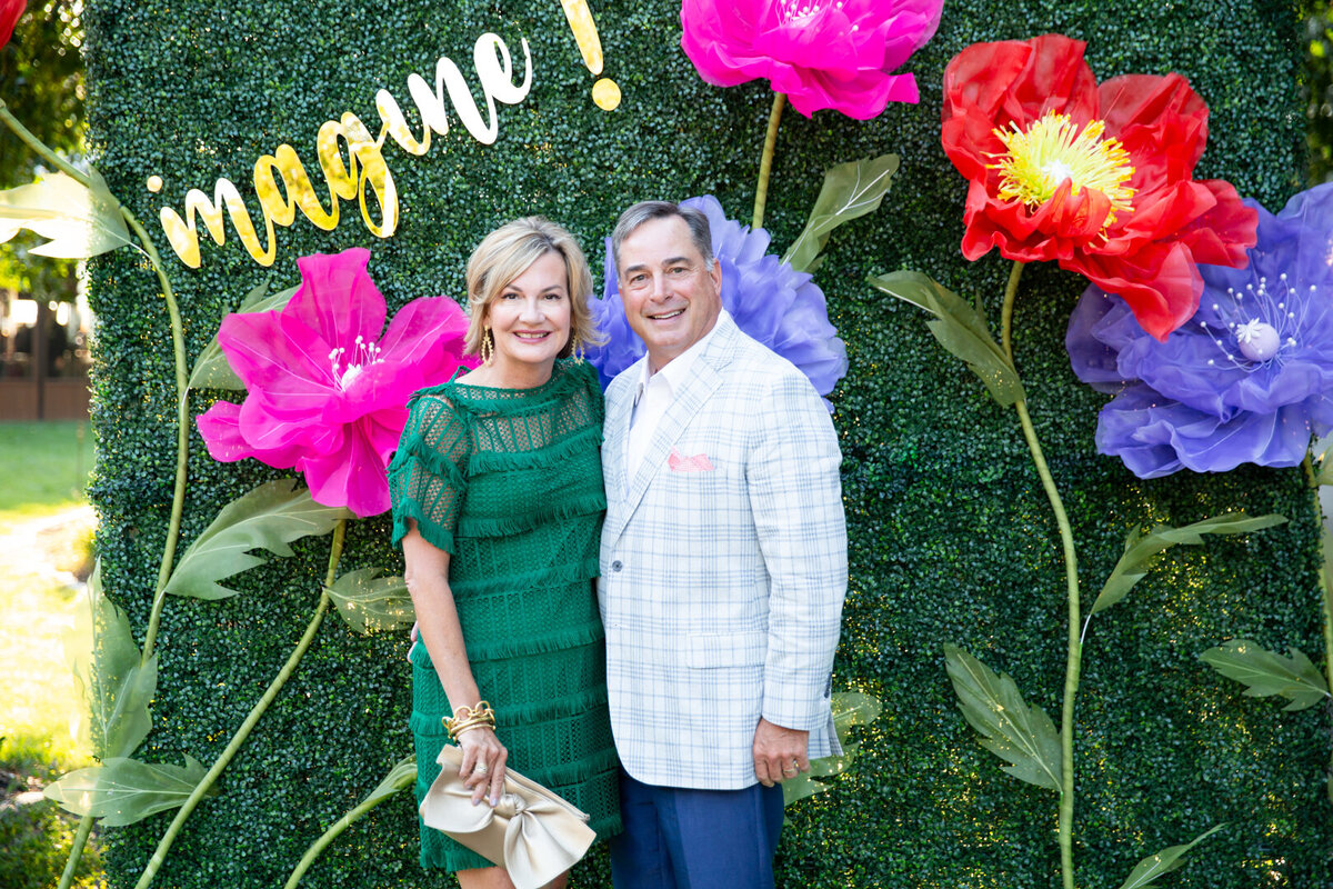 Couple smiling at the camera at the Foundation of Hope  by Raleigh Event Photographer