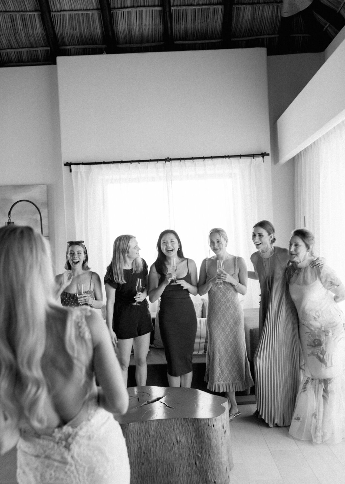 Bridesmaids seeing bride