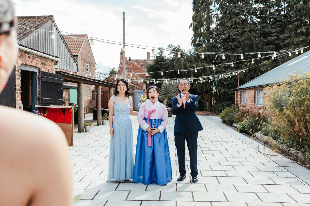 Bride dress reveal to Korean family at White Syke Fields York