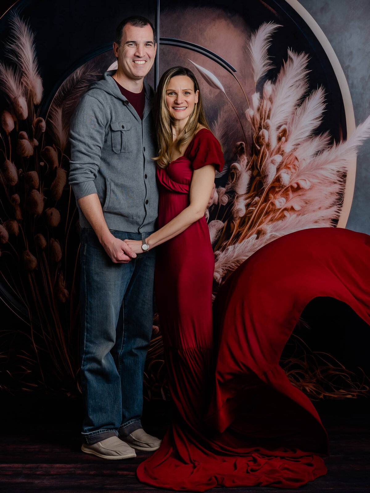 Husband and wife pose in studio for Prescott family photography session