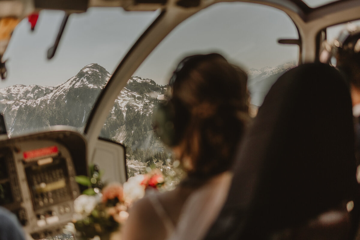 Bride riding in helicopter in whistler, BC