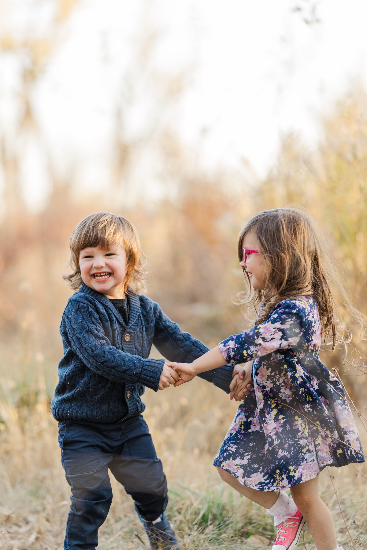 Candid kids fall photos in Omaha by Claire Katan.
