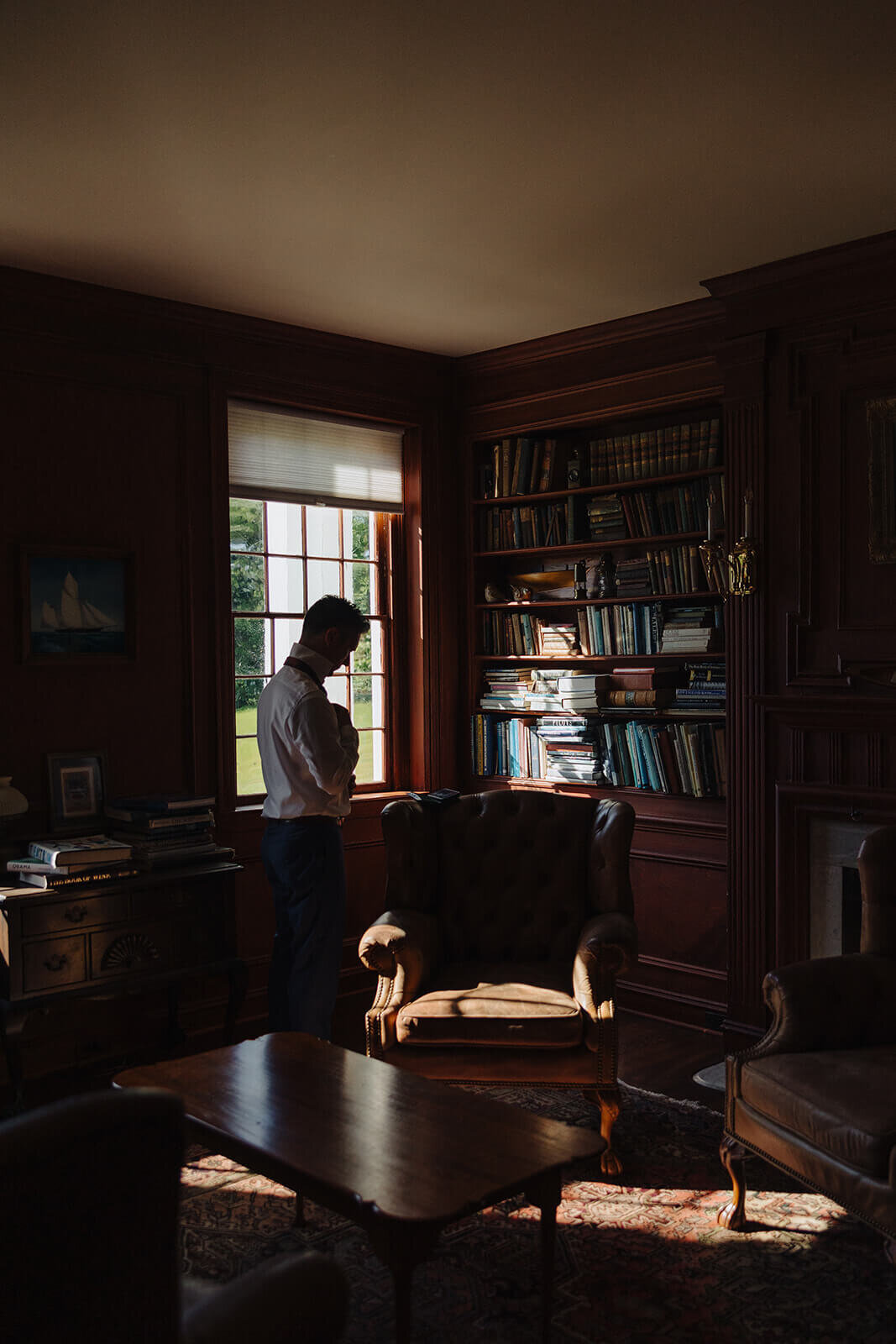 Groom getting ready for wedding in Finger Lakes, NY