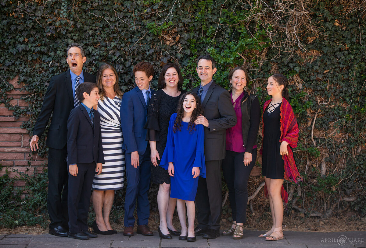 Fun Family Photo at Temple Emanuel in front of the Ivy Wall in Courtyard Denver CO