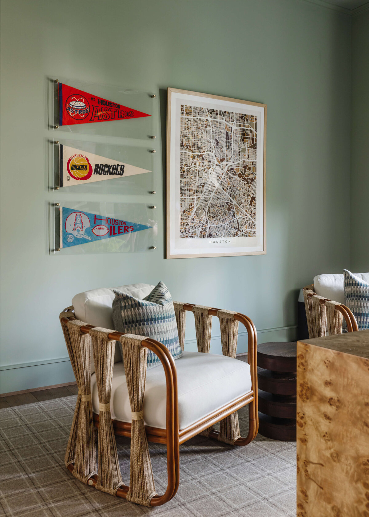 oyster creek studios memorial new build sports flags with map artwork and wooden chair with white cushion in sage study