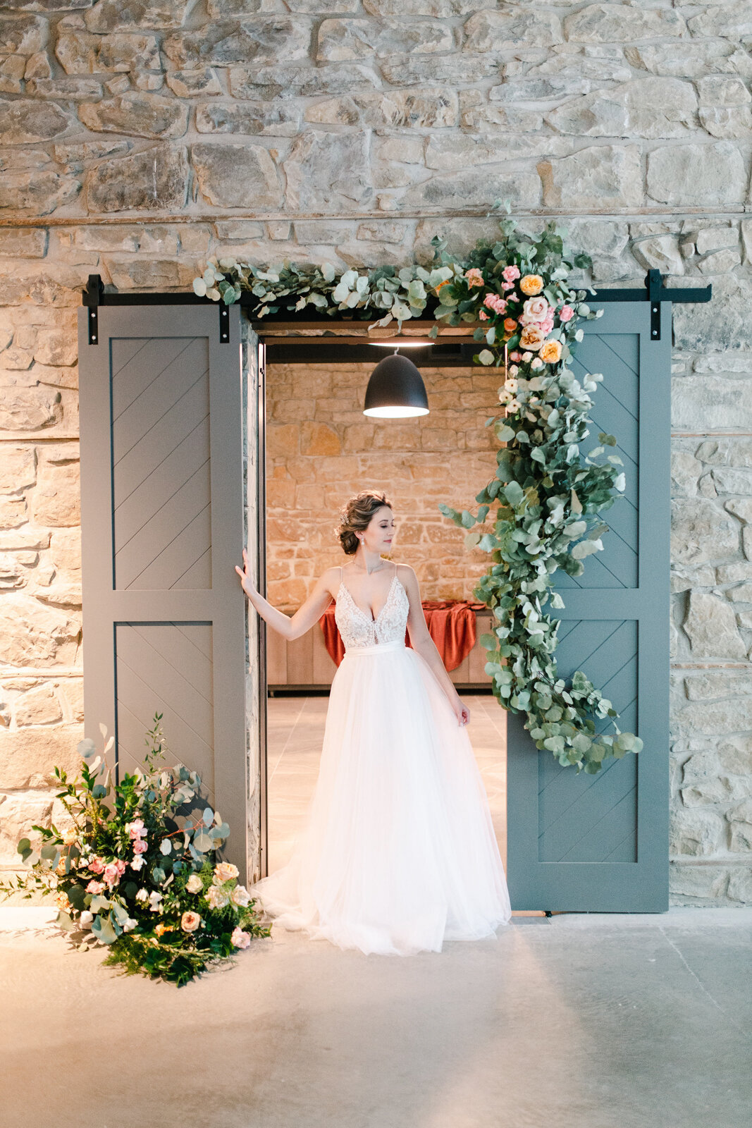 Beautiful and romantic bridals inside The Pioneer, a historical industrial wedding venue in Calgary, featured on the Brontë Bride Vendor Guide.