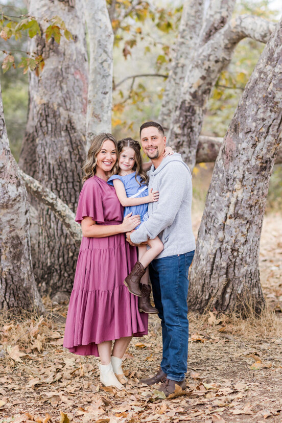 family-hugging-under-tree--sweetwater-river-bridge-san-diego