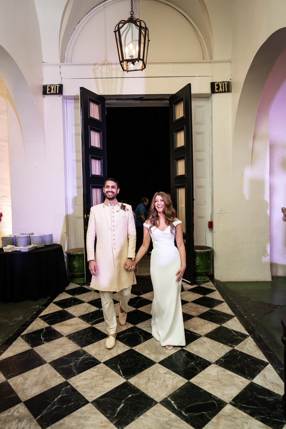 Bride and groom enter the reception