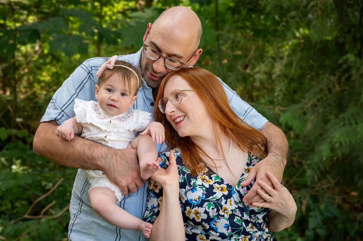 Family portrait session in Port Coquitlam park, capturing genuine smiles and natural connection outdoors