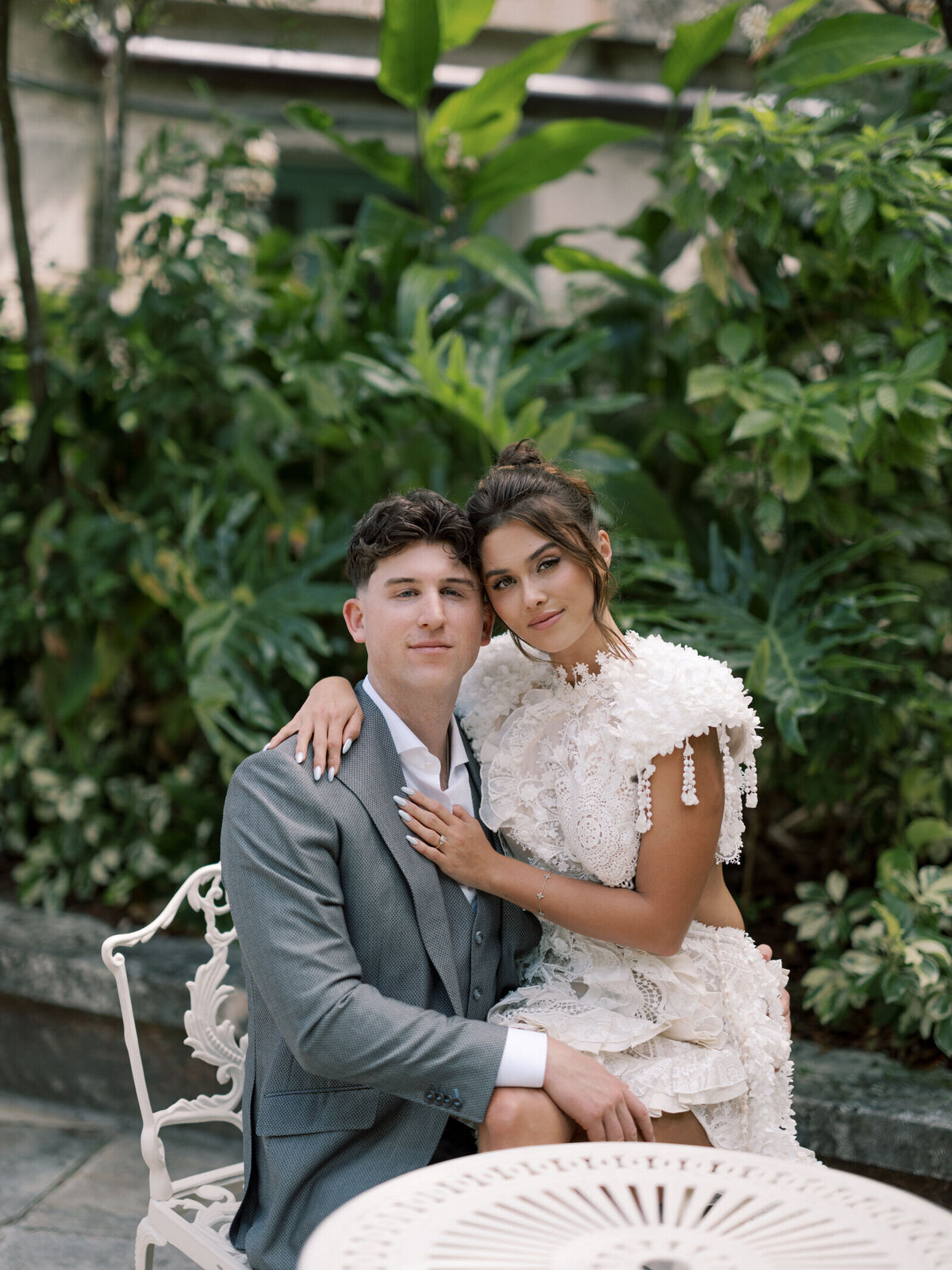 vizcaya-engagement-garden-chair-pose