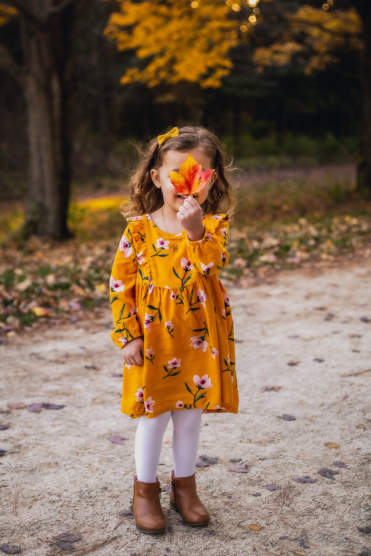 Fall in the midwest, child playing around.