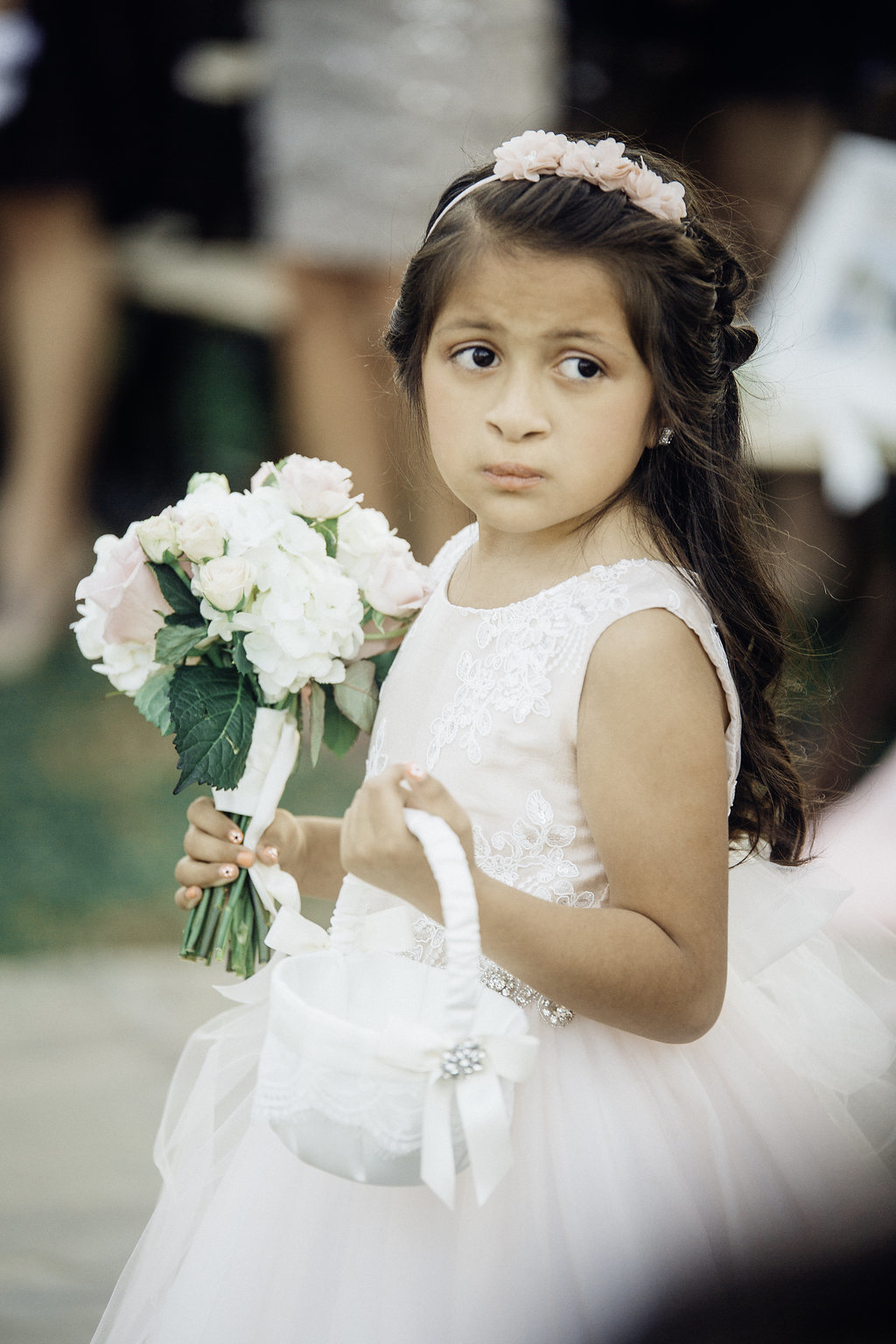 Wedding Photograph Of Flower Girl Carrying a Bouquet Los Angeles