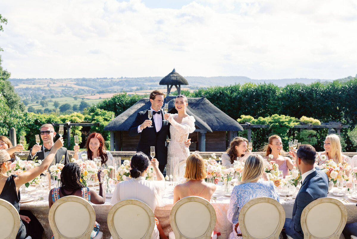 couple at wedding reception with champagne