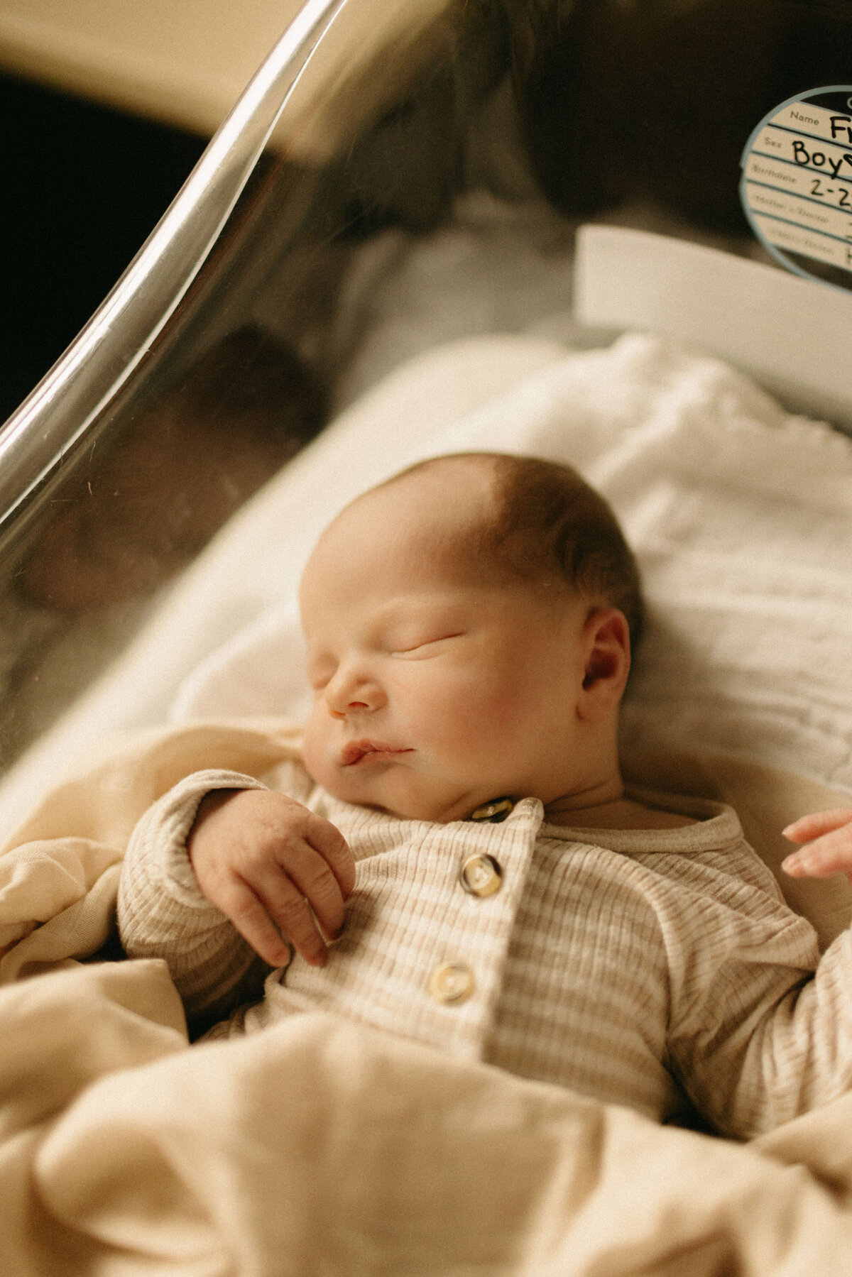 Close-up of newborn toes in hospital bassinet during Nashville Fresh 48.