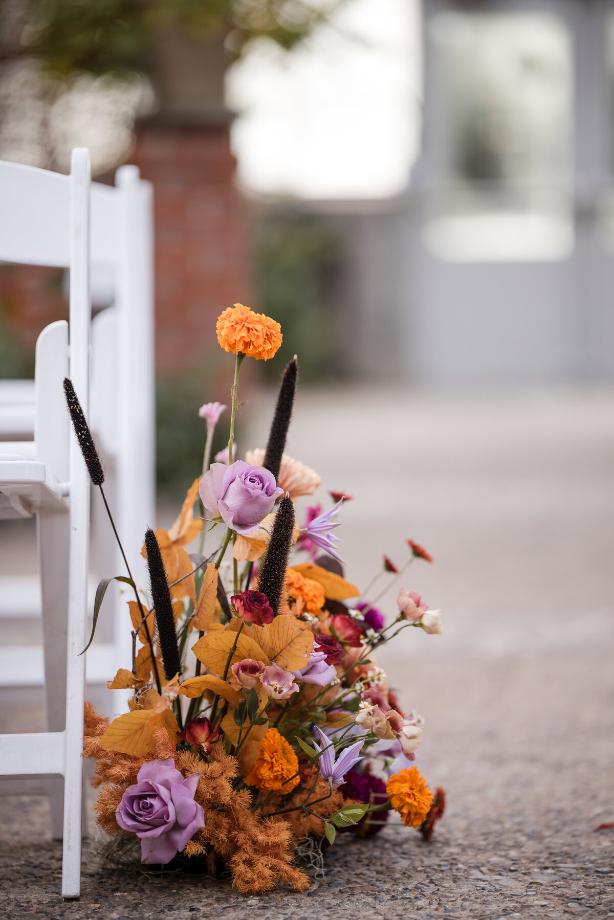 Orange and pink aisle runner flowers at a  Fairmount Park Horticulture Center wedding
