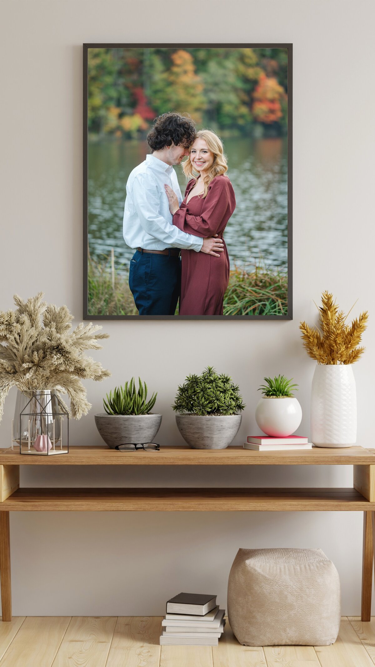 Gorgeous framed photo of engaged couple with fall leaves at Vogel State Park