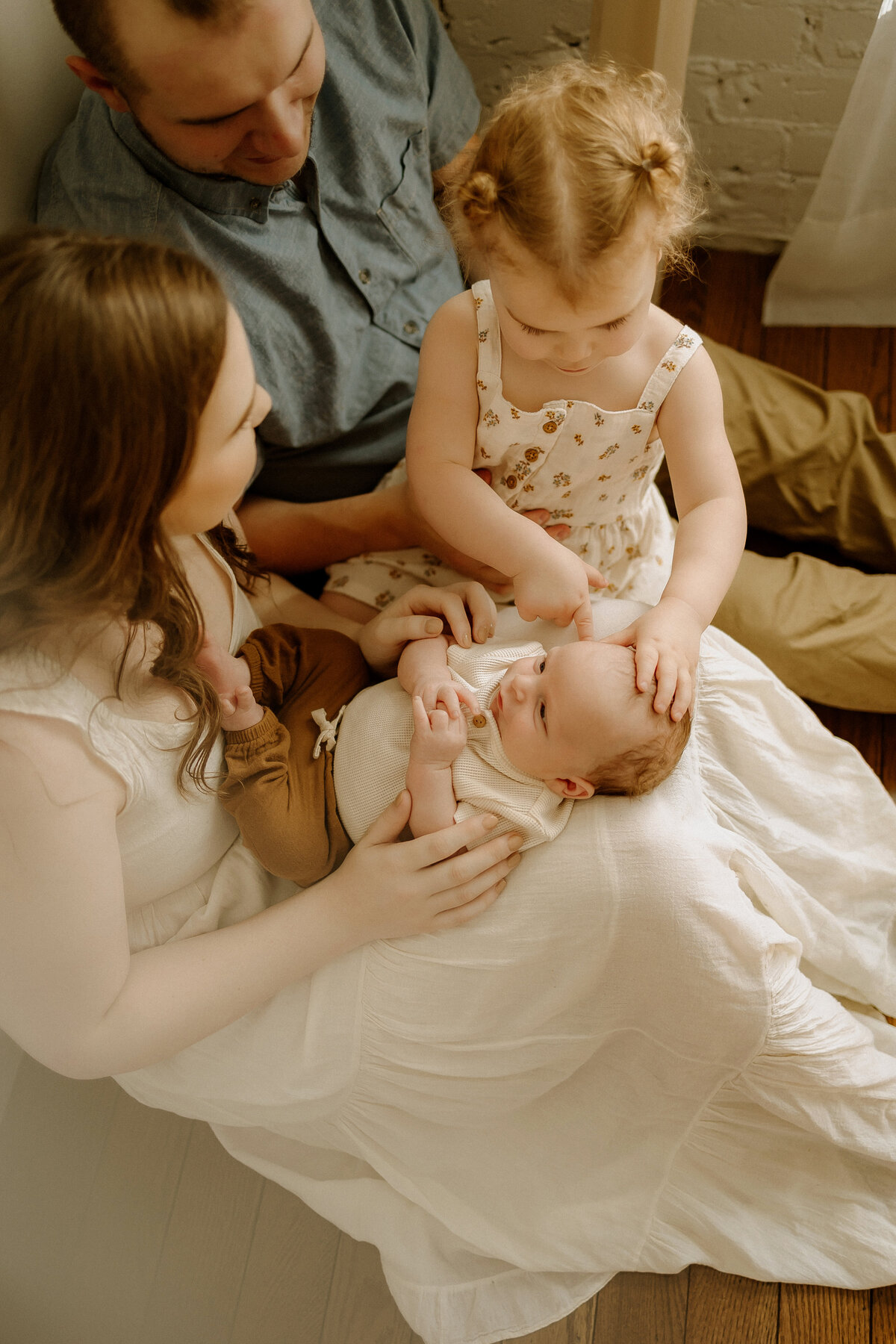 Discover the craftsmanship behind our exquisite newborn portraits. I take pride in creating timeless images that are a work of art in themselves.